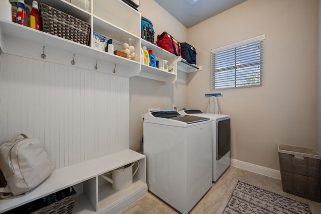 laundry room featuring separate washer and dryer