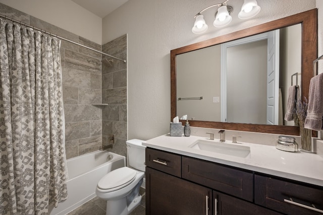 full bathroom with tile patterned floors, vanity, toilet, and shower / tub combo