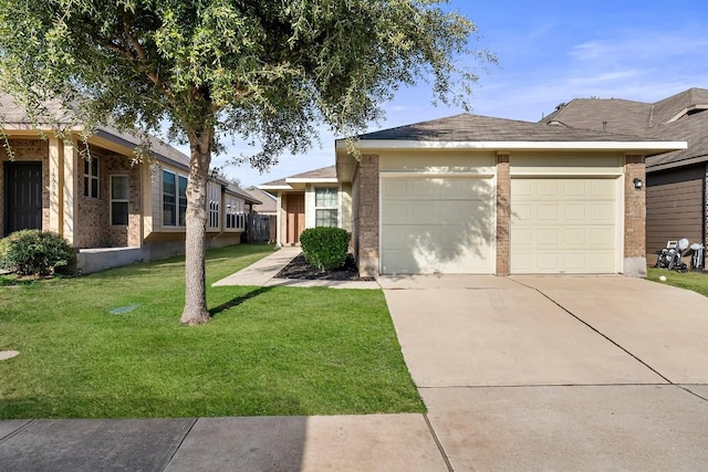 15210 Walcott Dr, Austin, TX 78725 - view of front of house with an attached garage, brick siding, concrete driveway, and a front lawn