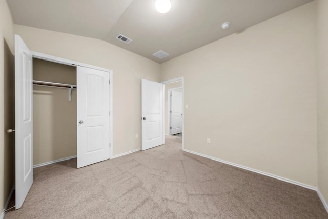 15210 Walcott Dr, Austin, TX 78725 - unfurnished bedroom featuring carpet, lofted ceiling, and a closet