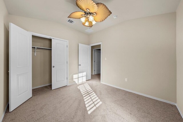 15210 Walcott Dr, Austin, TX 78725 - unfurnished bedroom with light carpet, vaulted ceiling, a closet, and ceiling fan