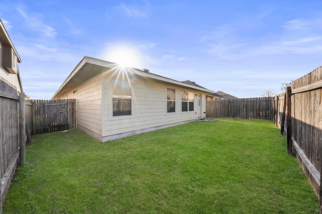 15210 Walcott Dr, Austin, TX 78725 - rear view of property with a fenced backyard