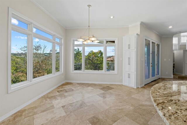 unfurnished dining area featuring ornamental molding