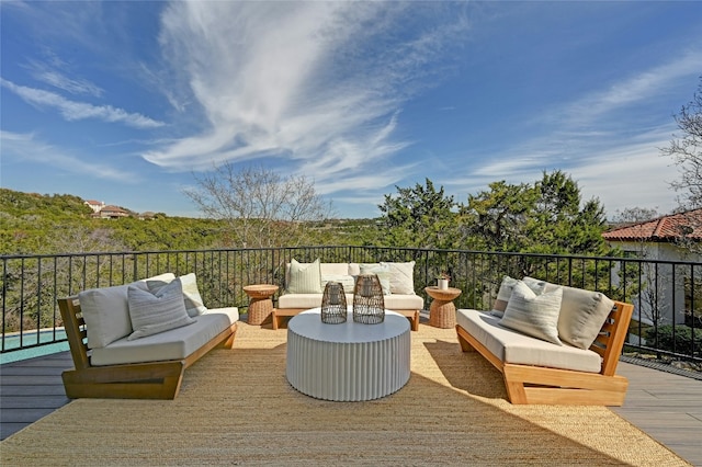 wooden deck featuring outdoor lounge area