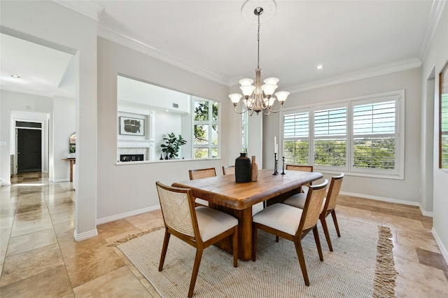 dining area with a chandelier, ornamental molding, recessed lighting, and baseboards