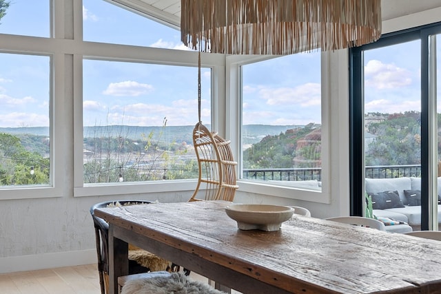 sunroom with plenty of natural light