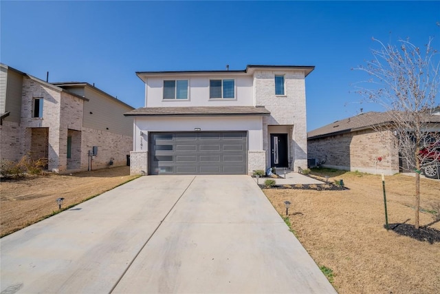 view of front facade featuring a garage and a front yard