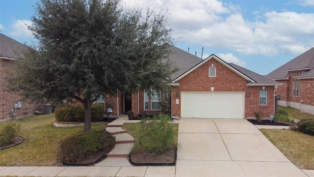 view of front of property featuring a garage and a front lawn