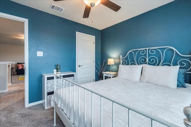 bedroom featuring ceiling fan and carpet flooring