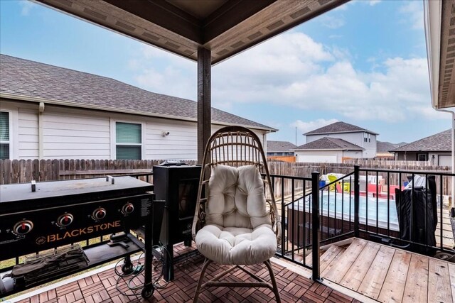 deck featuring a pool