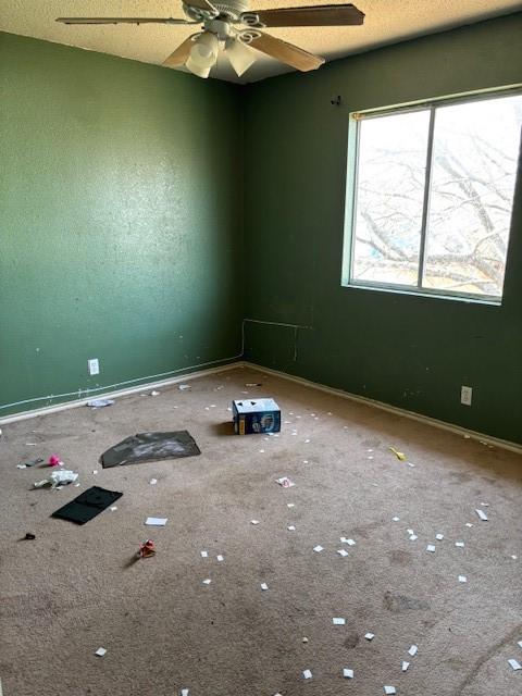 empty room with ceiling fan