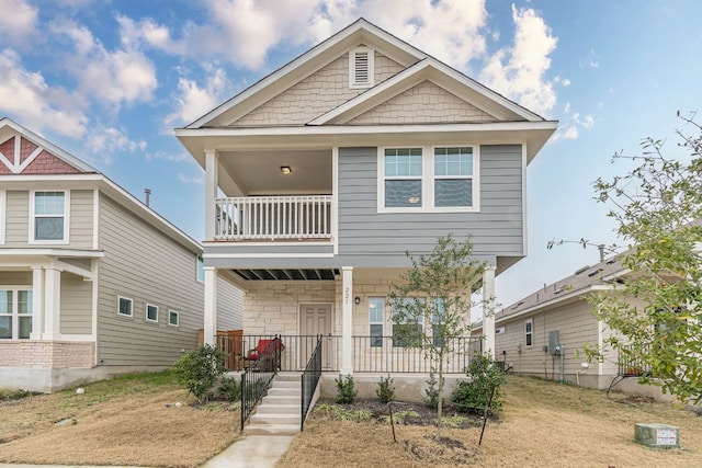 221 Duck Creek Trl, San Marcos, TX 78666 - view of front of home with a balcony and covered porch