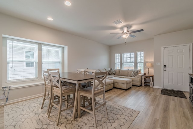 dining room with baseboards, visible vents, ceiling fan, light wood-type flooring, and recessed lighting