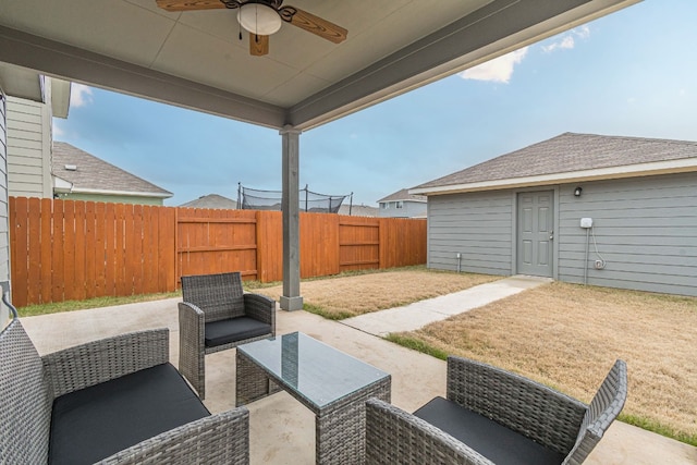 view of patio / terrace with a fenced backyard, ceiling fan, and an outdoor hangout area