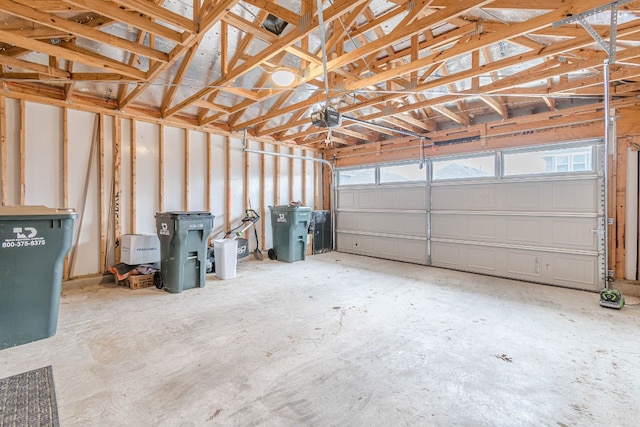 garage featuring a garage door opener