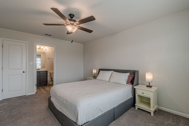 bedroom featuring visible vents, a ceiling fan, carpet flooring, connected bathroom, and baseboards