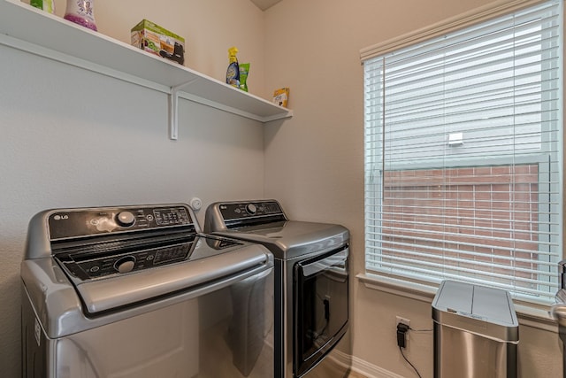 laundry area with washer and dryer and laundry area