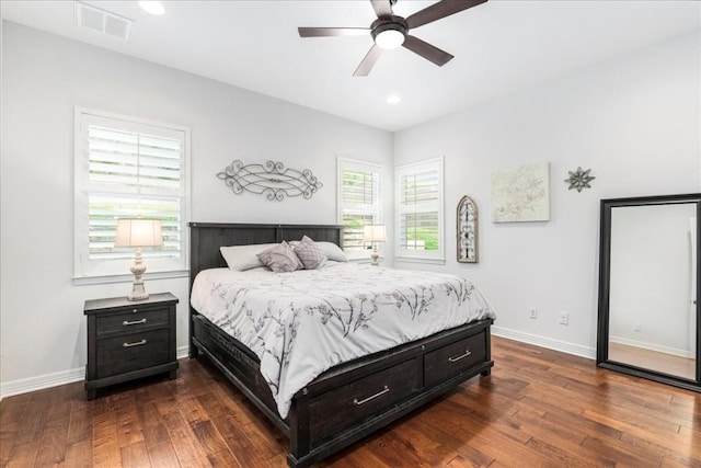 bedroom featuring dark wood-style floors, recessed lighting, visible vents, ceiling fan, and baseboards