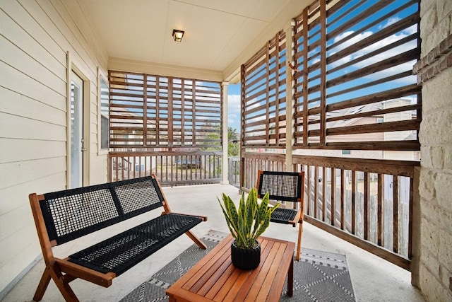 balcony featuring covered porch