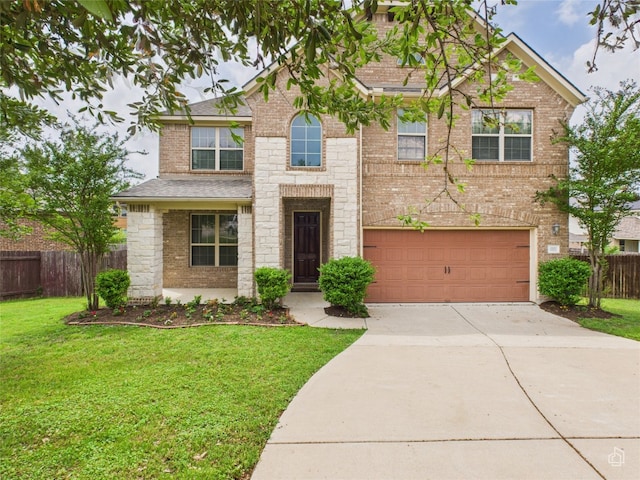 view of front of house with driveway, a garage, brick siding, fence, and a front lawn