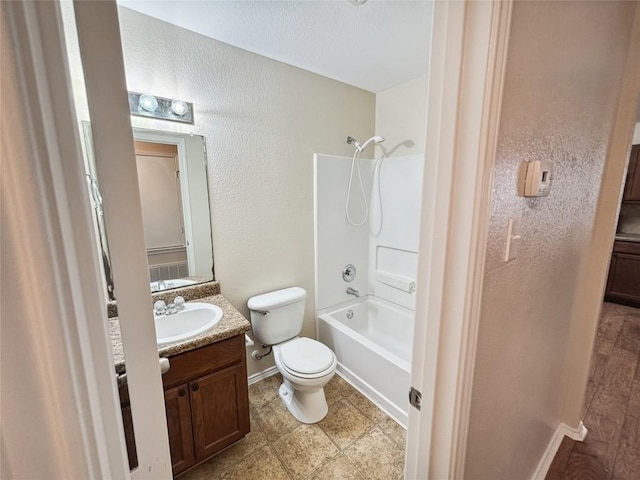 full bathroom with vanity, shower / bathtub combination, and toilet