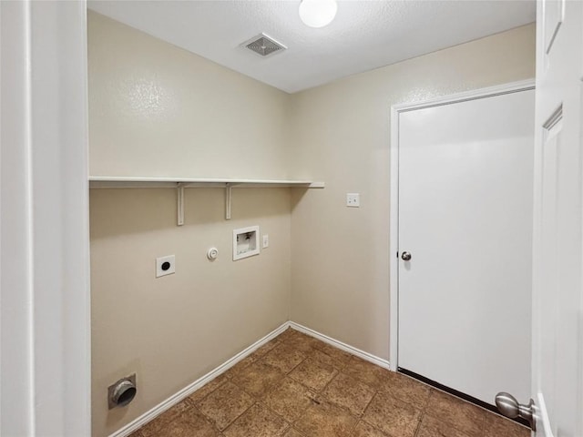 clothes washing area featuring hookup for a washing machine, electric dryer hookup, and hookup for a gas dryer