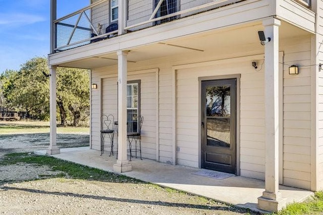 property entrance with a balcony