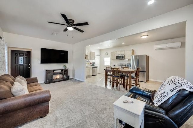 carpeted living room featuring a wall unit AC and ceiling fan