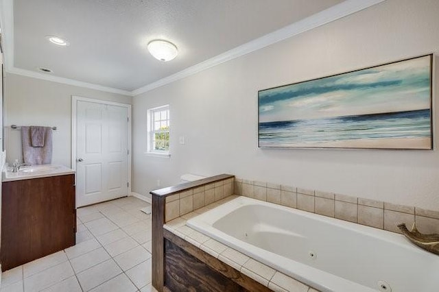 bathroom featuring tile patterned flooring, ornamental molding, tiled tub, and vanity