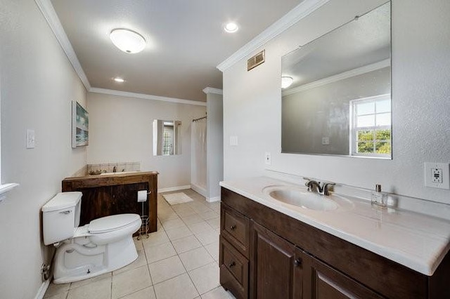 bathroom featuring vanity, crown molding, tile patterned floors, and toilet