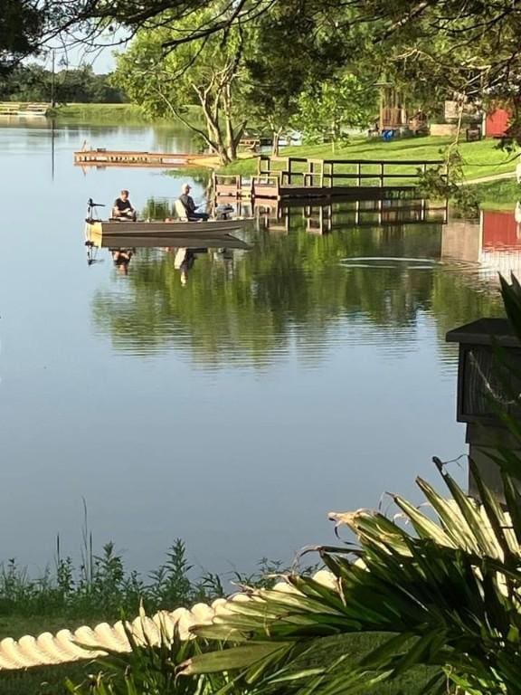 view of water feature with a boat dock