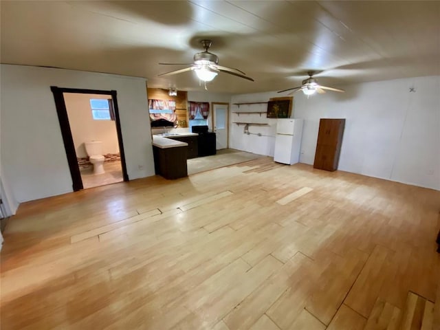 interior space featuring ceiling fan and light hardwood / wood-style flooring