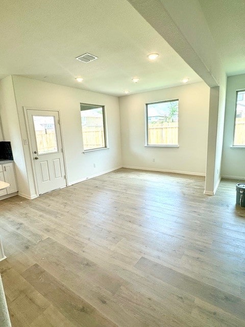 interior space with light hardwood / wood-style floors