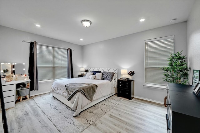17011 Prestons Braid Ln, Round Rock, TX 78664 - bedroom with light wood-style flooring, baseboards, and recessed lighting