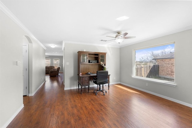 office area featuring dark hardwood / wood-style flooring, crown molding, and ceiling fan