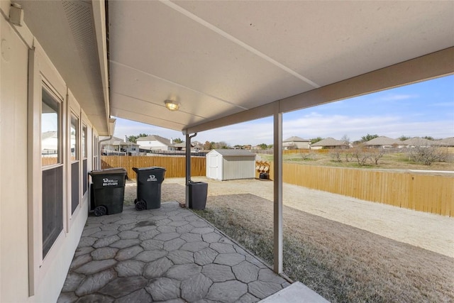 view of patio / terrace featuring a shed