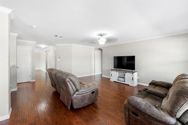 living room featuring crown molding, dark hardwood / wood-style floors, and ceiling fan