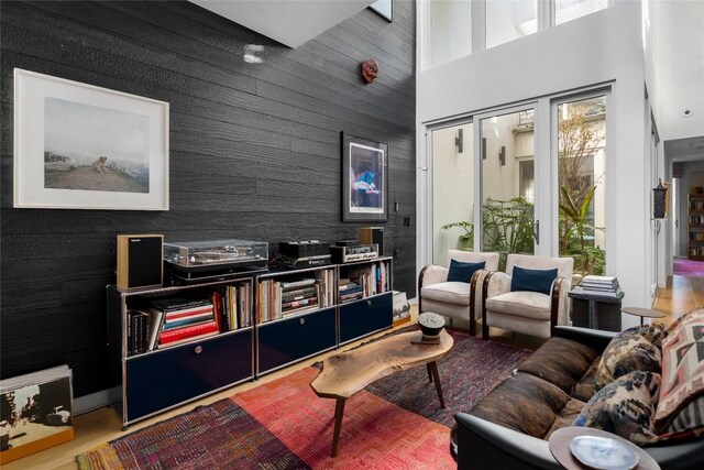 living room featuring a high ceiling