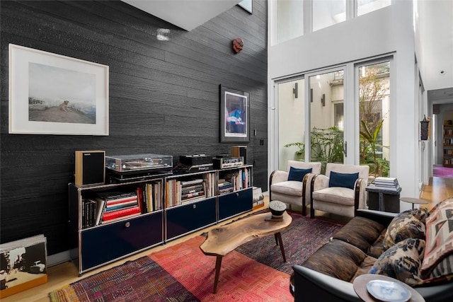 living area with a high ceiling