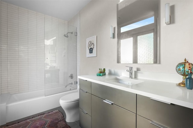 full bathroom with shower / bathing tub combination, toilet, and vanity