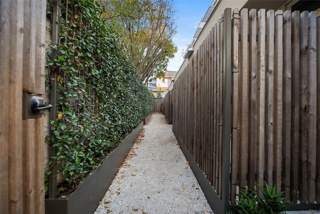 view of property exterior with fence