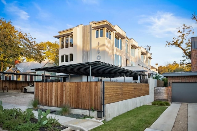 exterior space with brick siding and fence