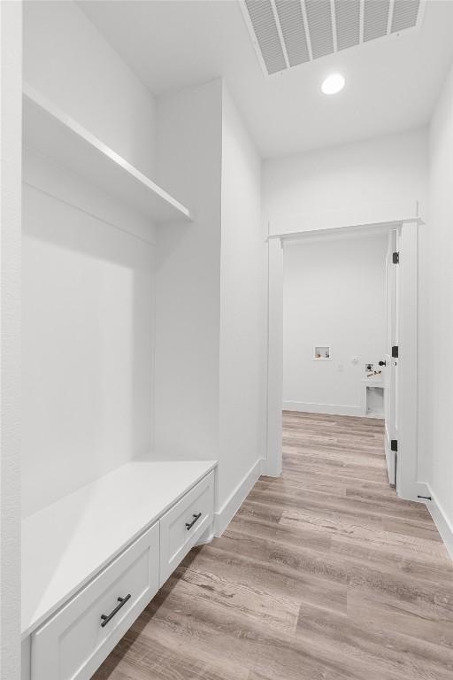 mudroom featuring light hardwood / wood-style flooring