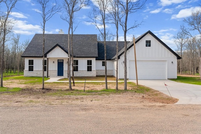 modern farmhouse with a garage