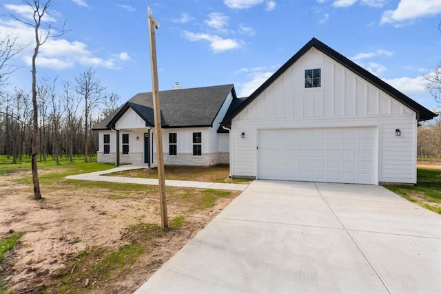 modern farmhouse featuring a garage