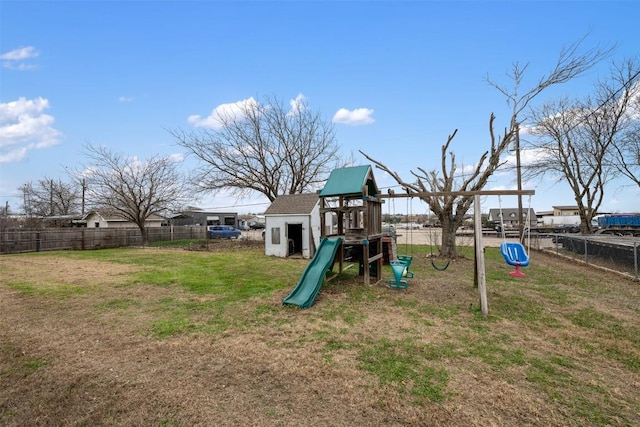 view of play area featuring a lawn