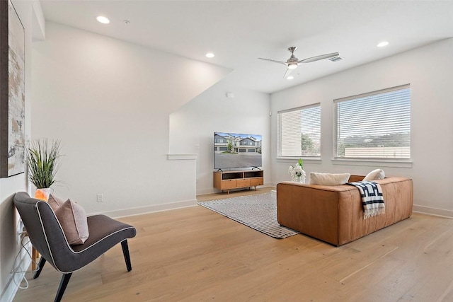 sitting room with recessed lighting, baseboards, ceiling fan, and light wood finished floors