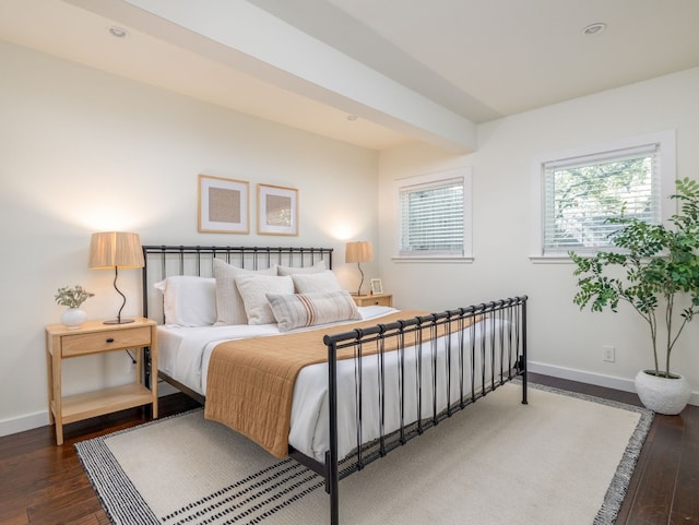 bedroom featuring dark wood-type flooring