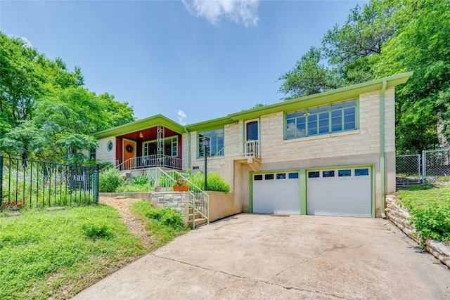 view of front of home featuring a garage and covered porch