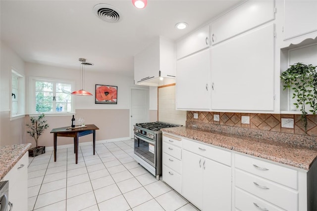 kitchen with white cabinetry, tasteful backsplash, hanging light fixtures, and stainless steel gas range oven